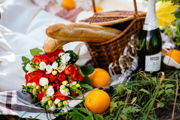 Healthy food, wine and accessories outdoor summer or spring picnic