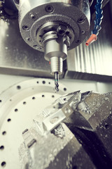 milling at CNC machine. industrial metalworking cutting process by cutter