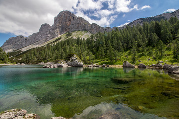 Naklejka na ściany i meble green Triglav lake with mount Tičarca