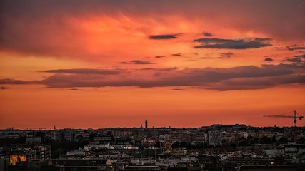 Burning sky over rome skyline in sunset time