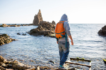 Man exploring Spanish coastline, Cabo de Gata - Nijar Natural Park, Spain