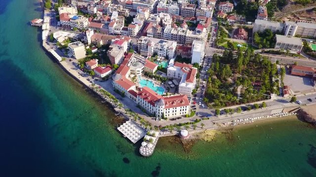 Aerial birds eye view video taken by drone of picturesque village of Aidipsos known for hot springs, North Evoia, Greece