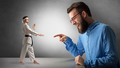 Giant hipster man yelling at a small karate man
