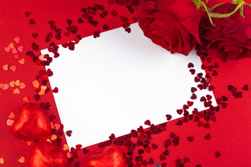 red rose and blank gift card for text