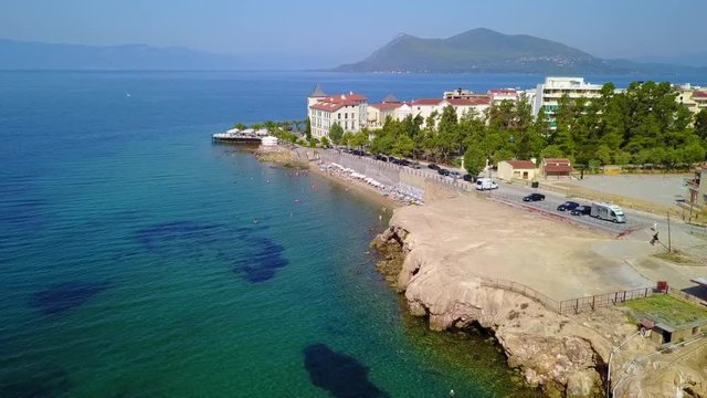 Aerial birds eye view video taken by drone of picturesque village of Aidipsos known for hot springs, North Evoia, Greece