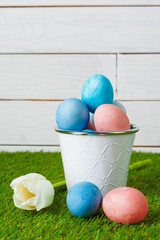 Easter Eggs with flower on Green Grass