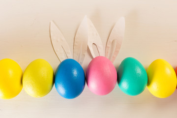 easter eggs on white wooden desk