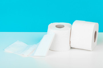 Roll of toilet paper or tissue  on color background