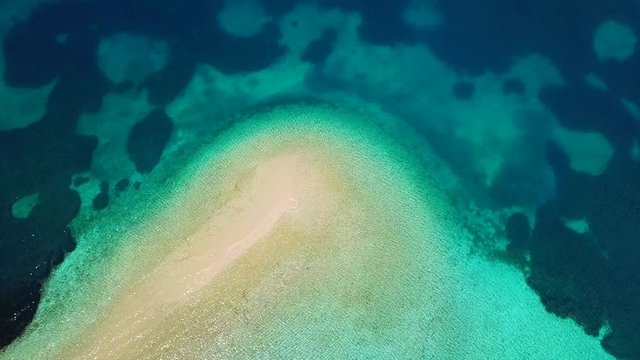 Aerial drone bird's eye view photo of Agia Triada island with beautiful turquoise and sapphire clear water beach, Central Evia, Greece