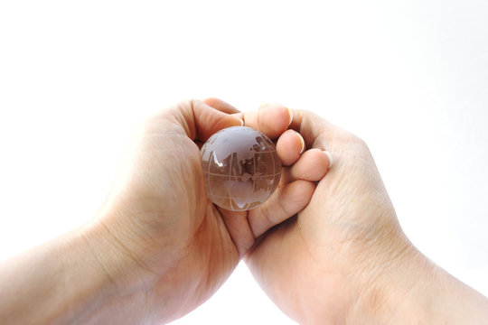 Woman Holding Crystal Earth Ball On White Background, Saving Earth Concept