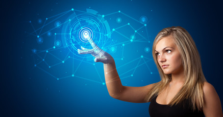 Woman touching hologram screen displaying keys and locks