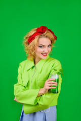 Saint Patrick's Day. St Patricks Day. Smiling woman holds glass with green beer. Green beer. Green...
