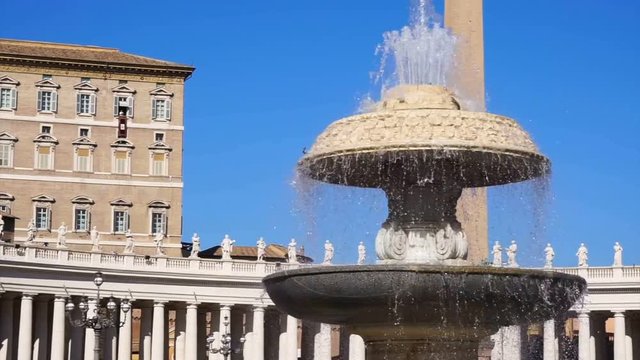 Extreme zoom video of iconic fountains in Saint Peter square, City of Vatican, Rome, Italy