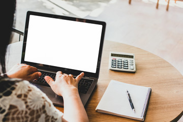 Newsletter concept Hand of businesswoman checking message box on mock up digital laptop Vintage...