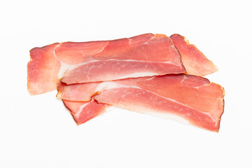 Hamon sliced on white background. Spanisch traditional meat.