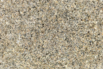 Marble texture with different colored spots. The surface of granite stone with streaks, spots and patterns of different colors. Visible stone texture with thick lines and mottled spots. 