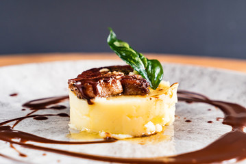 Mashed potato with meat and sauce