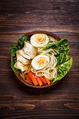 Ramen - soup with noodles, vegetables and chicken