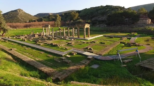Aerial drone video of ruins of Temple and Sanctuary of Artemis in archaeological site of Vravrona at winter time, Attica, Greece