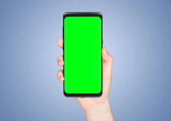 Woman hand holding modern smatphone mockup on white