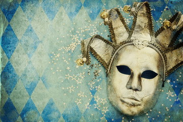 silver with gold elegant traditional venetian mask background