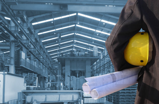 production engineer working in  commercial business building with the structural steel structure