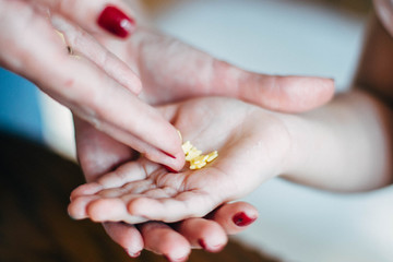 Hands of mother and child with decoration for cookies