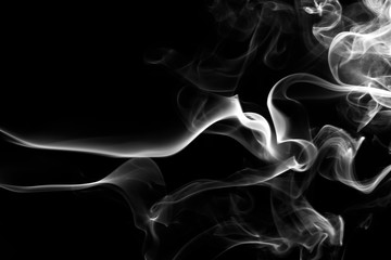 Fire of white smoke on black background. abstract movement