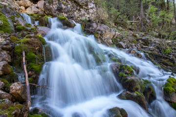 Fototapeta na wymiar small waterfall in Soteska Bohinj