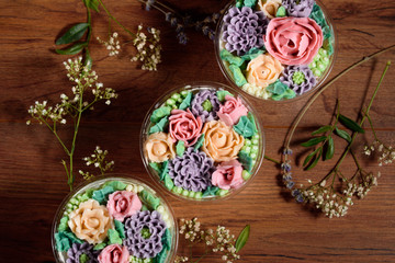 Delicious, appetizing, fragrant dessert. Triple delicious light dessert, decorated with oil flowers.