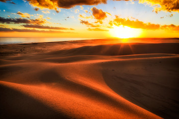 Fototapeta na wymiar Dunes Sun Horizon Sunset