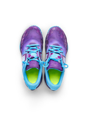 Top view of blue and purple trainers isolated on a white background.