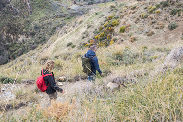 Two men hiking in Spain next to Granada