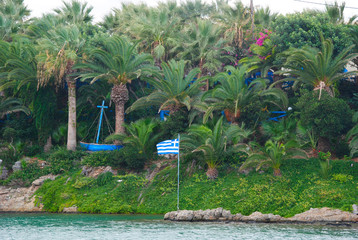 view on the grassy palm bay of Sisi on the isle Crete in Greece from the port of Sisi