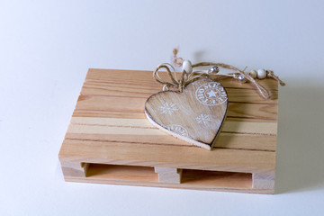 Wooden heart on mini pallet