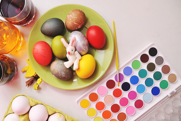 Easter eggs and decorations on table.