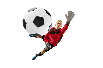 Male soccer player goalkeeper catching ball in jump. Silhouette of fit man with ball isolated on...