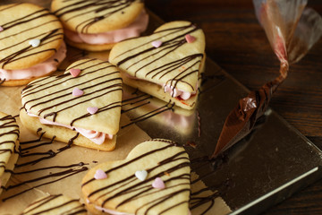 marshmallow sandwiches decorated with chocolate and little sugar hearts