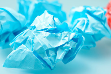 creative idea concept background with colourful crumbled paper ball