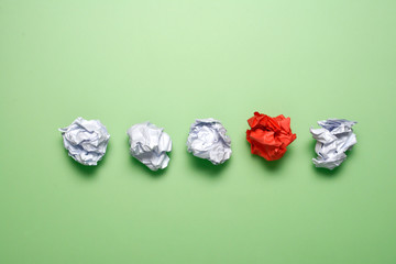 Crumpled paper set with a two colors on green background