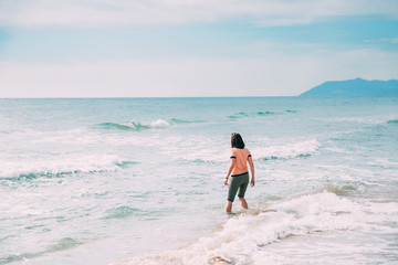 Young Caucasian Lady Woman Walking In Summer Sea Ocean Beach
