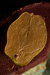 Chic cake with chocolate and pear cream. Delicious cake for the holiday decorated with pear.