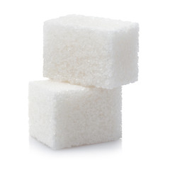 Close-up of two white sugar cubes, isolated on white background