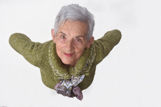 Portrait View From Above Of An Older Woman On White Background