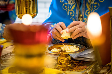 the priest prepares the sacrament, the sacrament, the Sacrament of the Holy blood and flesh of...
