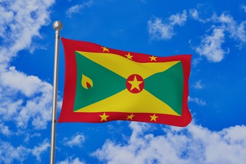 Grenada national flag waving isolated in the blue cloudy sky