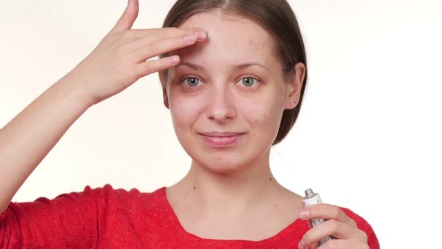 girl with a problem face without makeup. pimples. face care. care cosmetics