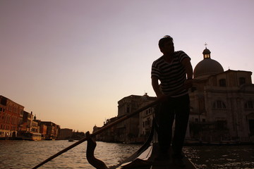 gondolier in Venice at sunset