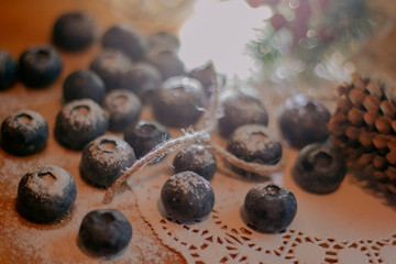 blueberries under powdered sugar
