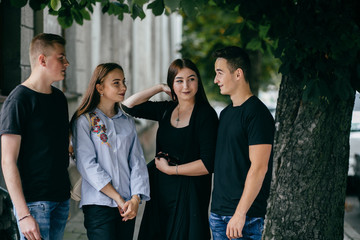 Group of friends laughing out loud outdoor